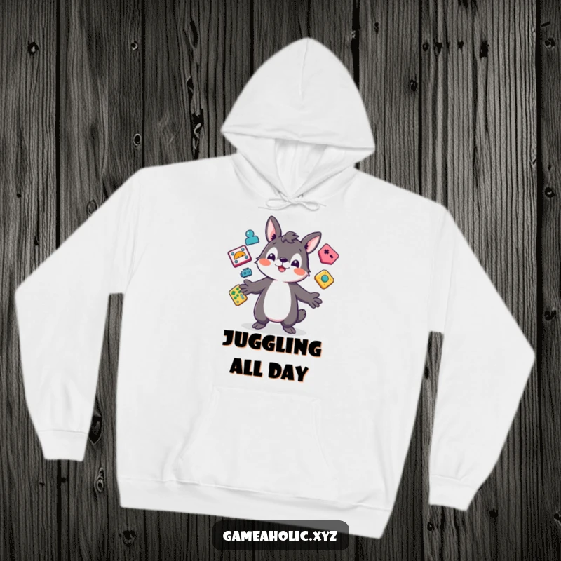Funny Hoodie featuring a playful animal character juggling colorful, abstract game icons, designed for ultimate gaming comfort.