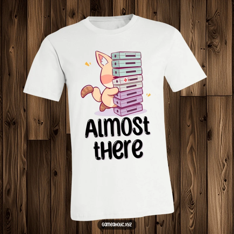 Funny tripping gamer t-shirt depicting a clumsy animal character hilariously tripping and dropping a large stack of game cartridges.